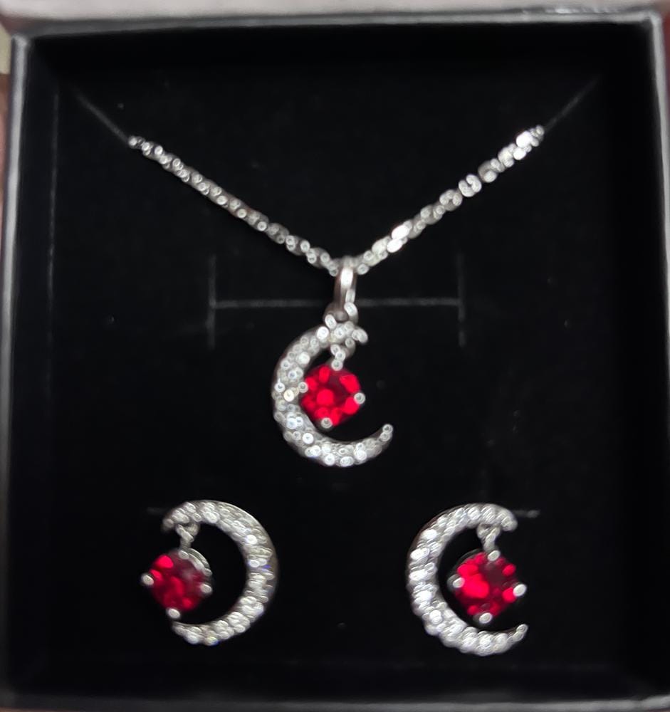 Customer photo review of Luna Birthstone Necklace 18k White Gold Plated Crescent Pendant Necklace with Round Cut Swarovski Crystals