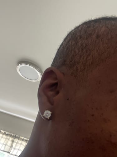 Customer photo review of Certified VVS Moissanite Cushion Cut Stud Earrings