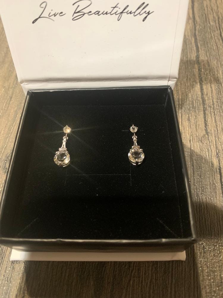 Customer photo review of Isla 18k White Gold Plated Dangle Earrings with Round Swarovski Crystals
