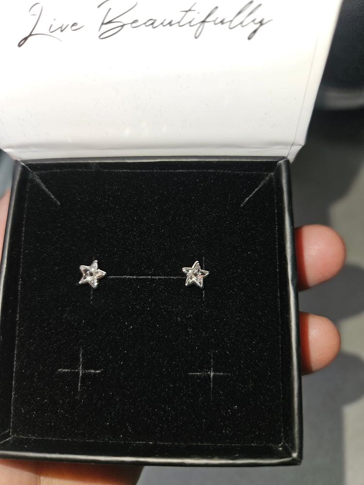Customer photo review of Lealani 18k White Gold Plated Stud Earrings with Swarovski Crystals