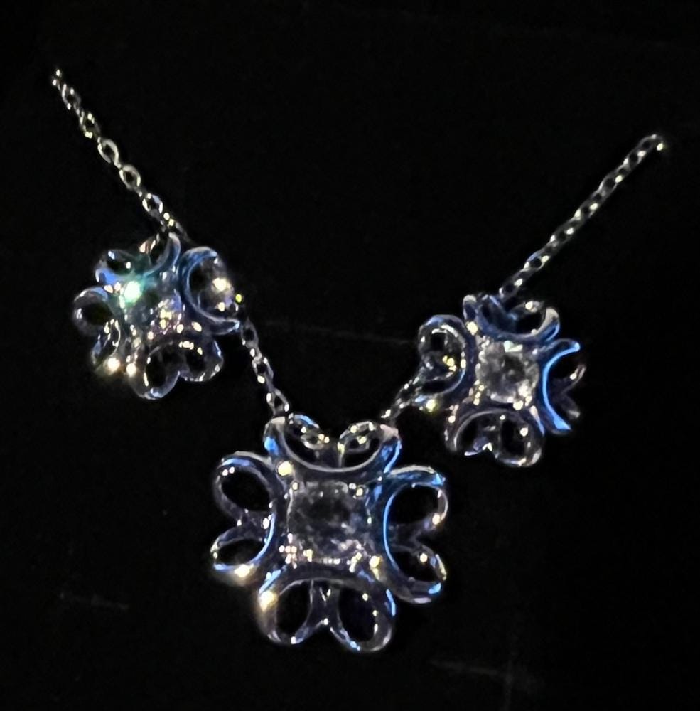 Customer photo review of Alexis 18k White Gold Plated Flower Pendant Necklace with Swarovski Crystal