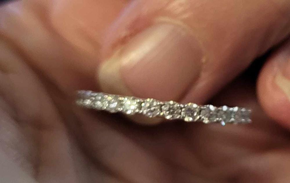 Customer photo review of Moissanite by Cate & Chloe Sadie 0.9tcw Round Cut 925 Sterling Silver 18k White Gold Plated Wedding Band