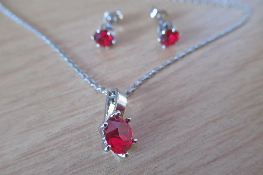 Customer photo review of Birthstone Earrings 18k White Gold Plated Stud Earrings with 1ct Solitaire Swarovski Crystals