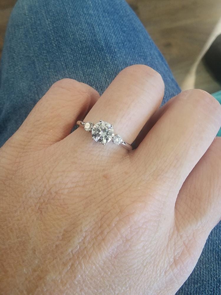 Customer photo review of Moissanite by Cate & Chloe Sarah 1.22tcw Round Cut 925 Sterling Silver 18k White Gold Plated Engagement Ring
