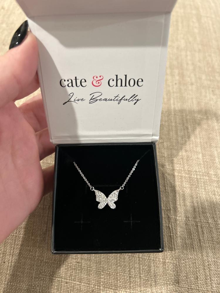 Customer photo review of Yuenen 18k White Gold Plated Butterfly Necklace with Swarovski Crystals & Heartfelt Message for Daughter