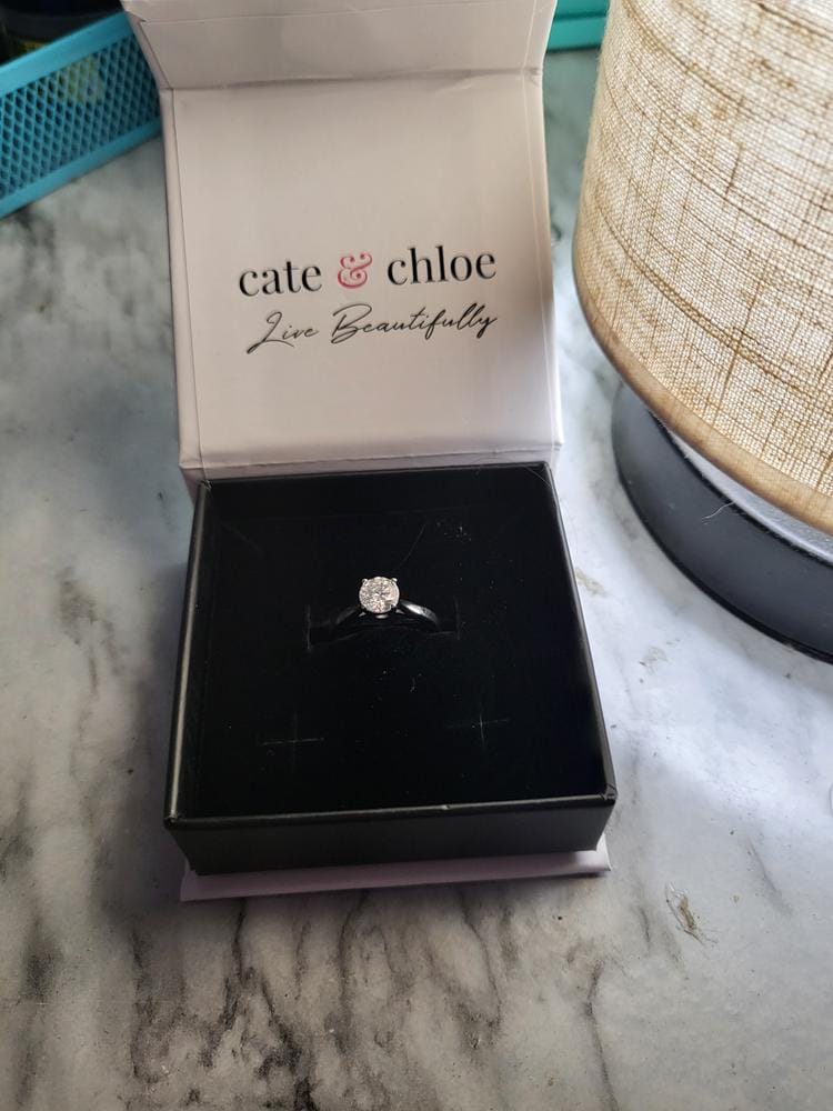 Customer photo review of Moissanite by Cate & Chloe Abigail 1.0tcw Round Cut 925 Sterling Silver 18k White Gold Plated Engagement Ring