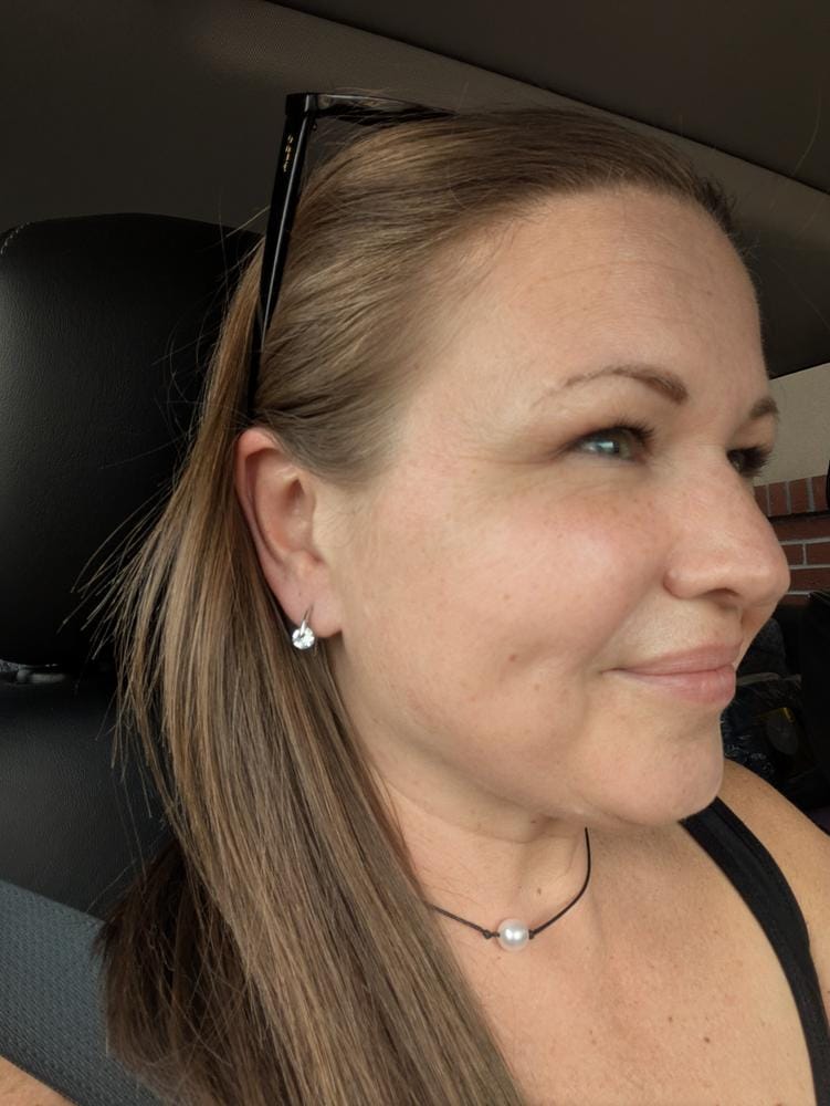 Customer photo review of McKayla 18k White Gold Plated Drop Earrings with Swarovski Crystals