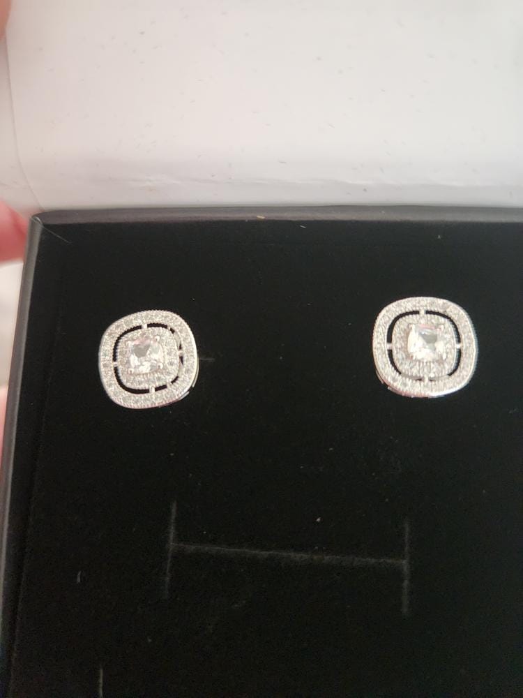 Customer photo review of Noelle 18k White Gold Plated Halo Stud Earrings with Simulated Diamond Crystals