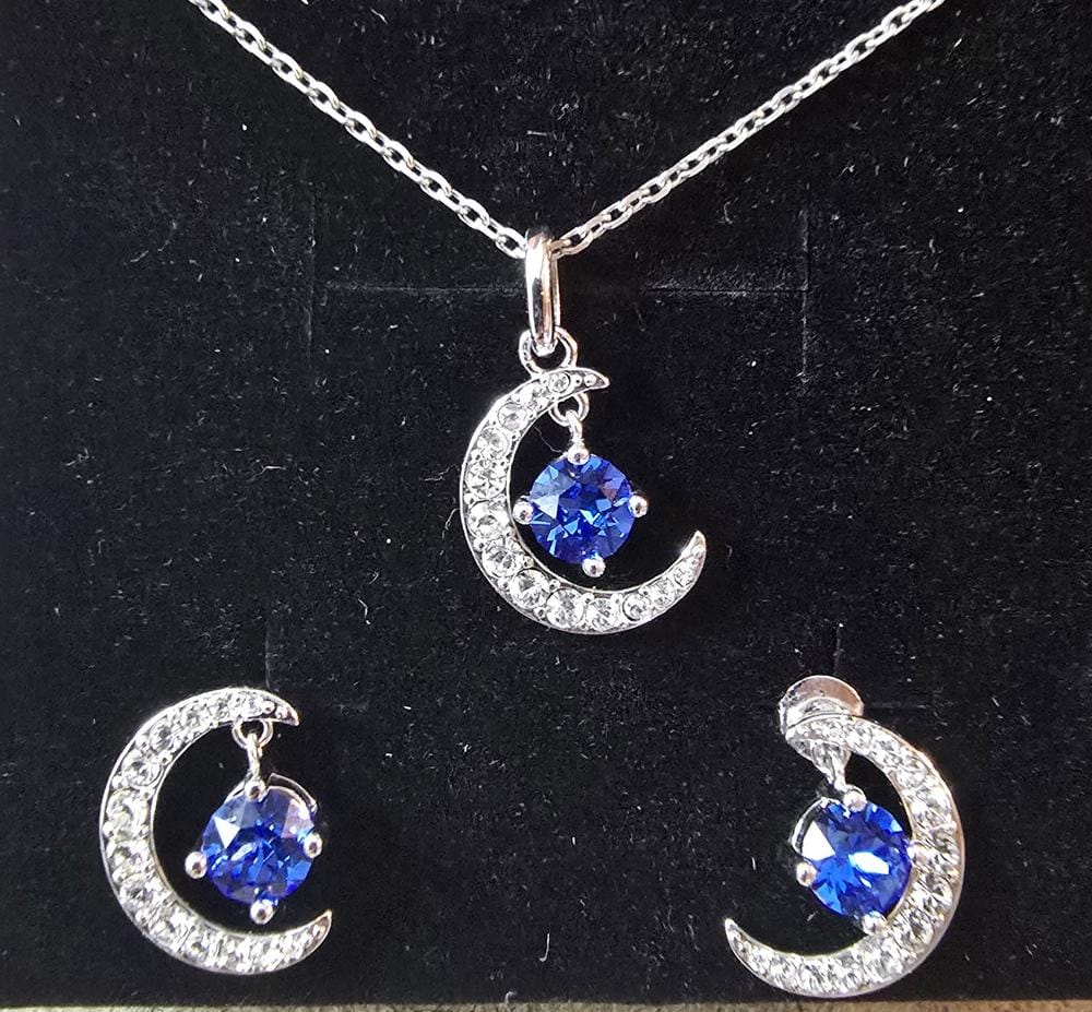 Customer photo review of Luna Birthstone Necklace 18k White Gold Plated Crescent Pendant Necklace with Round Cut Swarovski Crystals