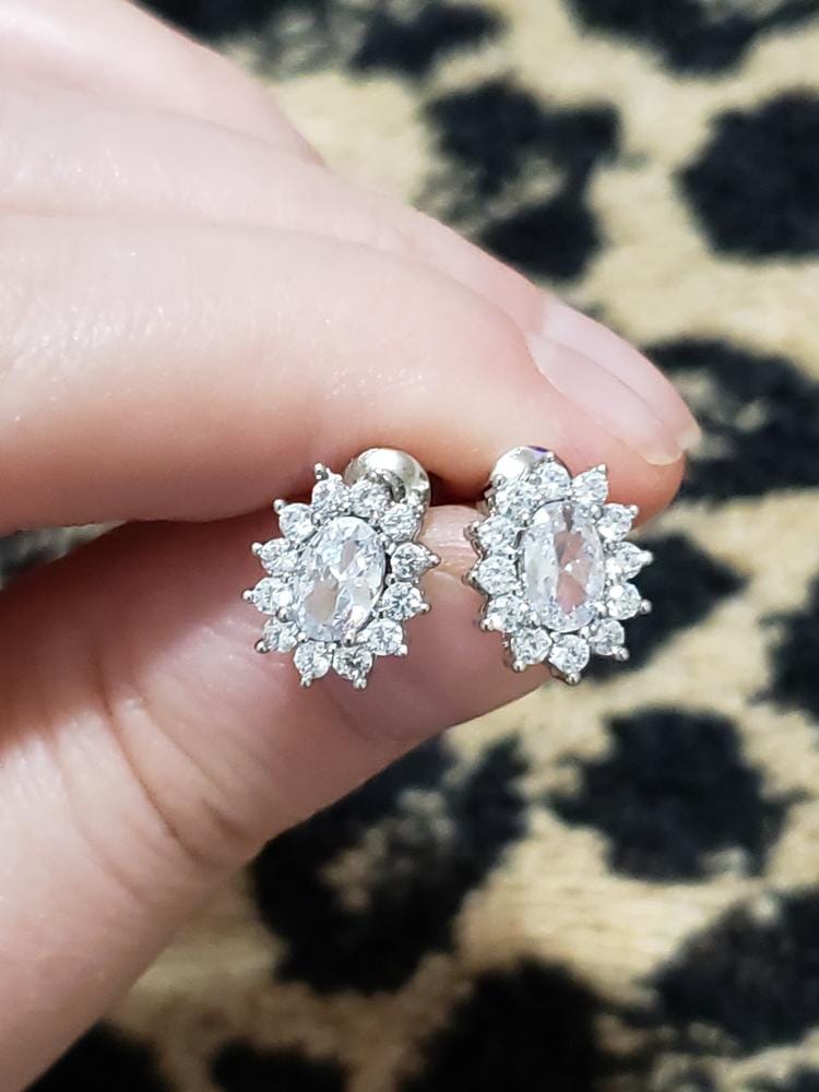 Customer photo review of Eloise 18k White Gold Plated Stud Earrings with Solitaire Round Cut Swarovski Crystal