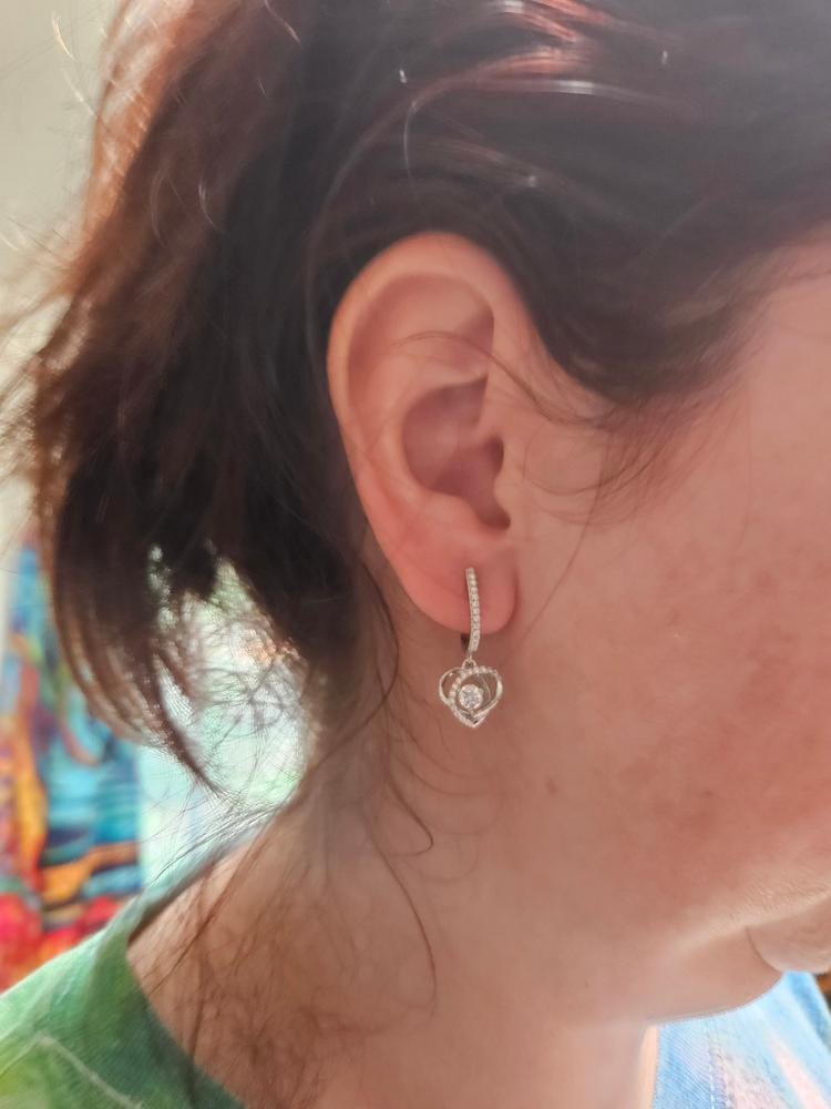 Customer photo review of Moissanite by Cate & Chloe Naomi 18k Gold Plated 925 Sterling Silver Dangle Earrings 0.9tcw