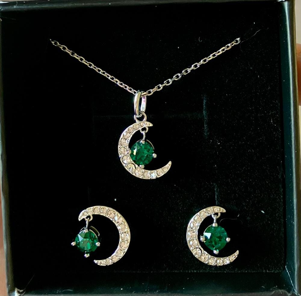 Customer photo review of Luna Birthstone Necklace 18k White Gold Plated Crescent Pendant Necklace with Round Cut Swarovski Crystals