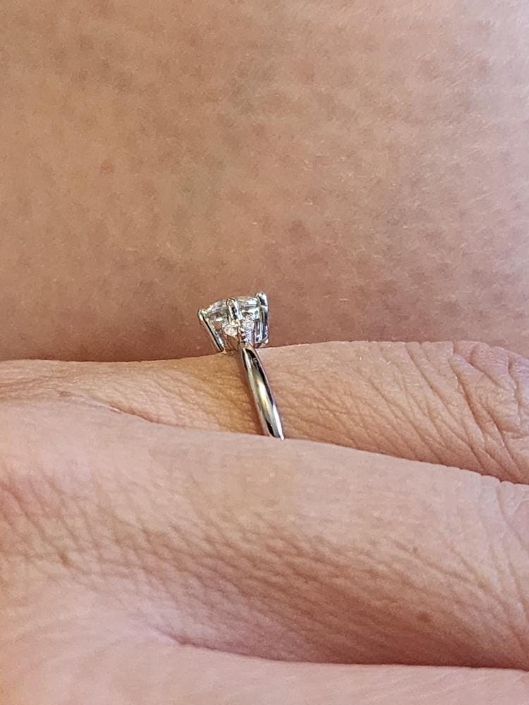 Customer photo review of Moissanite by Cate & Chloe Sarah 1.22tcw Round Cut 925 Sterling Silver 18k White Gold Plated Engagement Ring