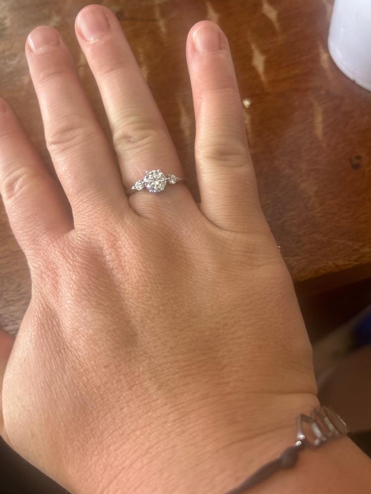 Customer photo review of Moissanite by Cate & Chloe Sarah 1.22tcw Round Cut 925 Sterling Silver 18k White Gold Plated Engagement Ring