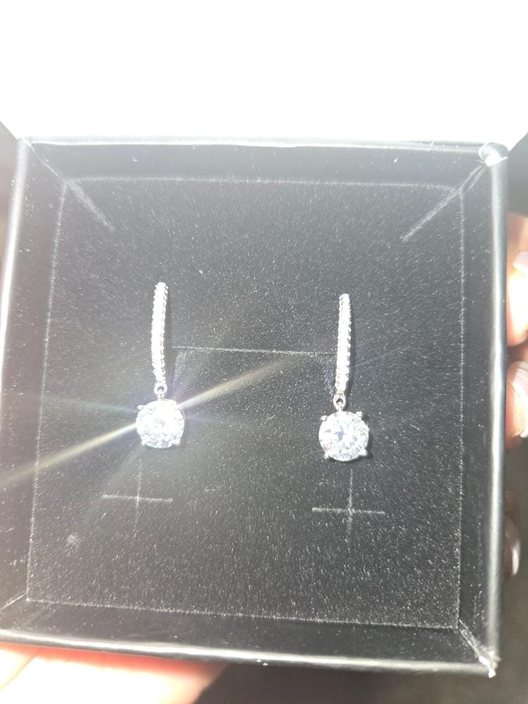 Customer photo review of Moissanite by Cate & Chloe Finley 18k Gold Plated 925 Sterling Silver Dangle Earrings 2.13tcw