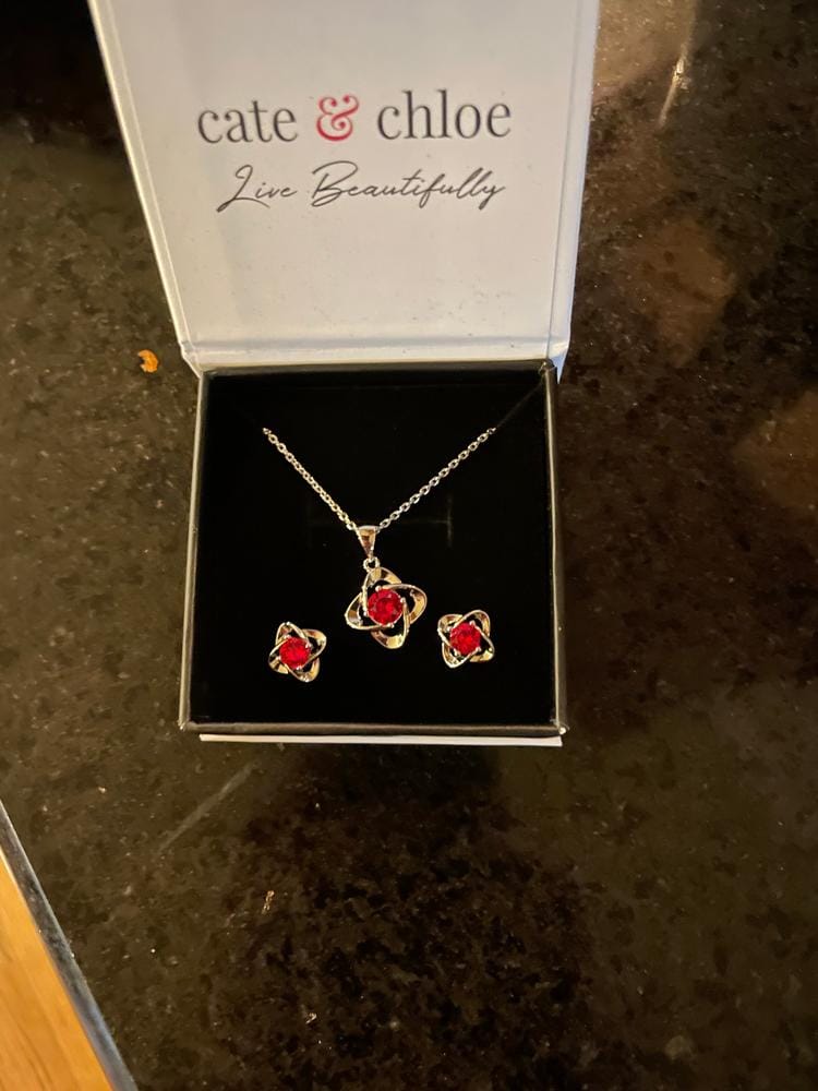 Customer photo review of Infinity 18k White Gold Plated Birthstone Flower Earrings with Swarovski Crystals