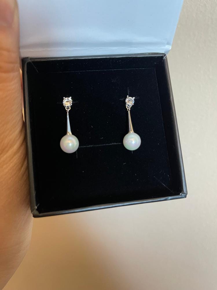 Customer photo review of Tatum 18k White Gold Plated Pearl Dangling Stud Earrings with Swarovski Crystal
