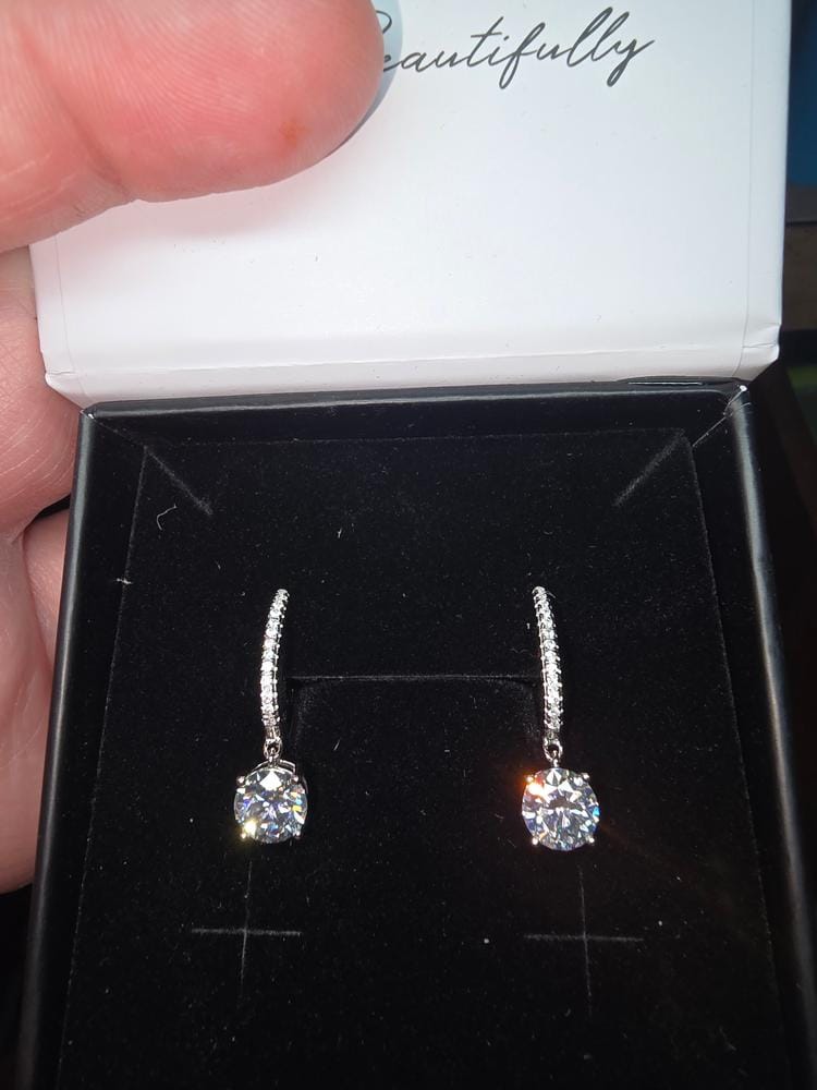 Customer photo review of Moissanite by Cate & Chloe Finley 18k Gold Plated 925 Sterling Silver Dangle Earrings 2.13tcw