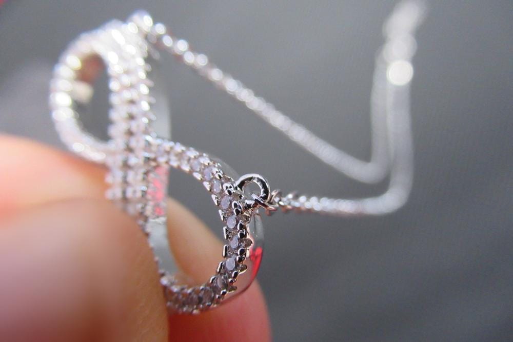 Customer photo review of Tansy 18k White Gold Plated Infinity Pendant Necklace with Simulated Diamond Crystals
