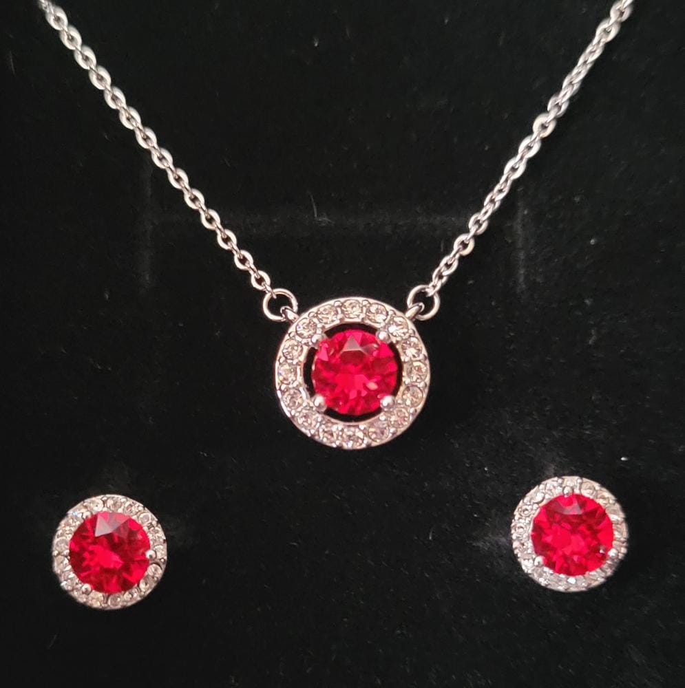 Customer photo review of Royal Birthstone 18k White Gold Plated Halo Stud Earrings with Round Cut Swarovski Crystals
