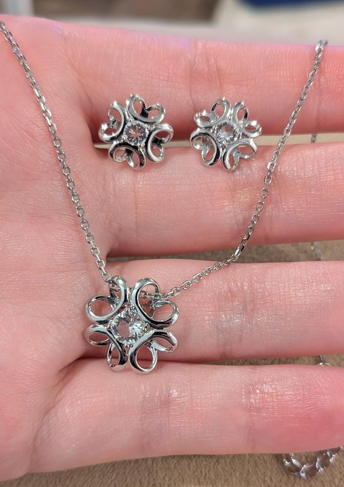 Customer photo review of Alexis 18k White Gold Plated Flower Pendant Necklace with Swarovski Crystal