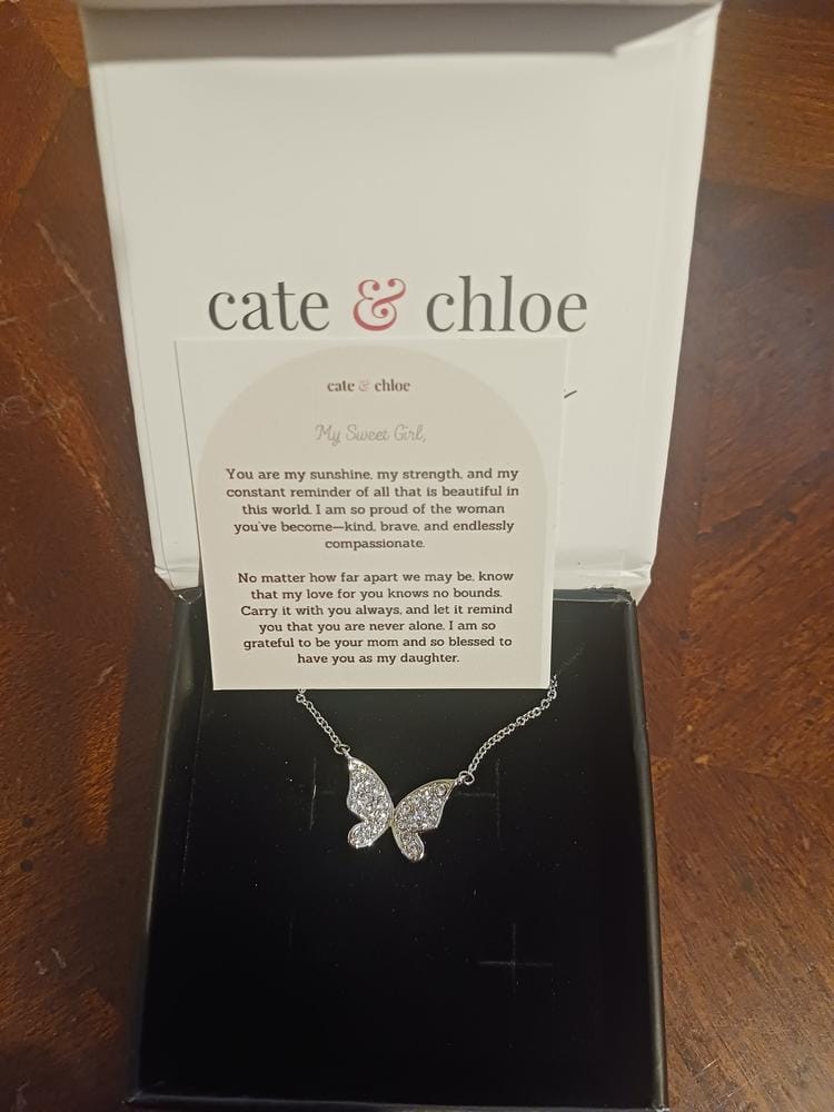 Customer photo review of Yuenen 18k White Gold Plated Butterfly Necklace with Swarovski Crystals & Heartfelt Message for Daughter