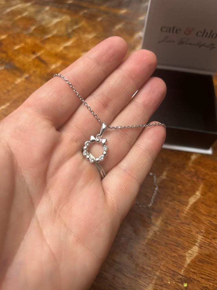 Customer photo review of Edith 18k White Gold Plated Silver Ribbon Necklace and Earring Set with Swarovski Crystals