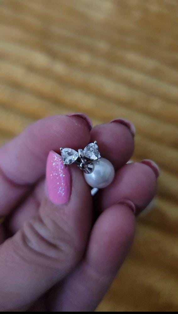 Customer photo review of Oakley 18k White Gold Plated Silver Drop Pearl Earrings with Swarovski Crystals