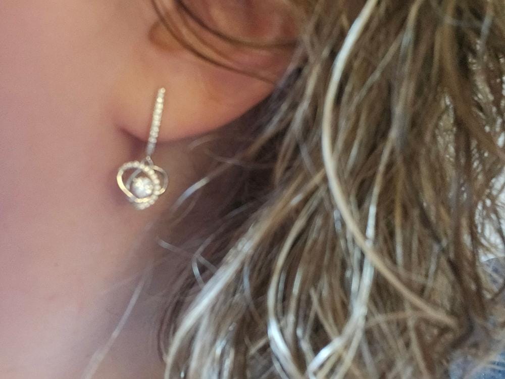 Customer photo review of Moissanite by Cate & Chloe Naomi 18k Gold Plated 925 Sterling Silver Dangle Earrings 0.9tcw