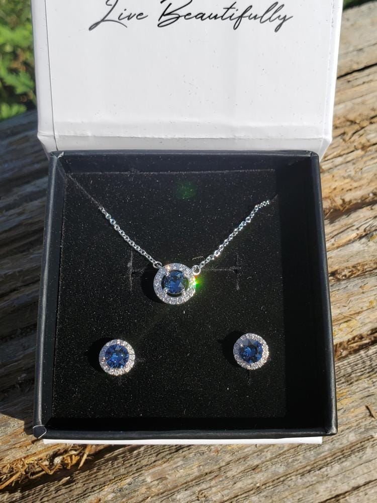 Customer photo review of Royal Birthstone 18k White Gold Plated Halo Stud Earrings with Round Cut Swarovski Crystals