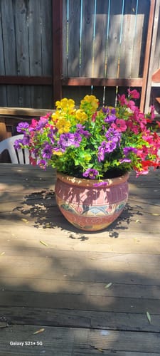 Customer photo review of Bulk 20 Bundles Artificial Flowers for Outdoor Fake Plants for Spring Decoration Wholesale