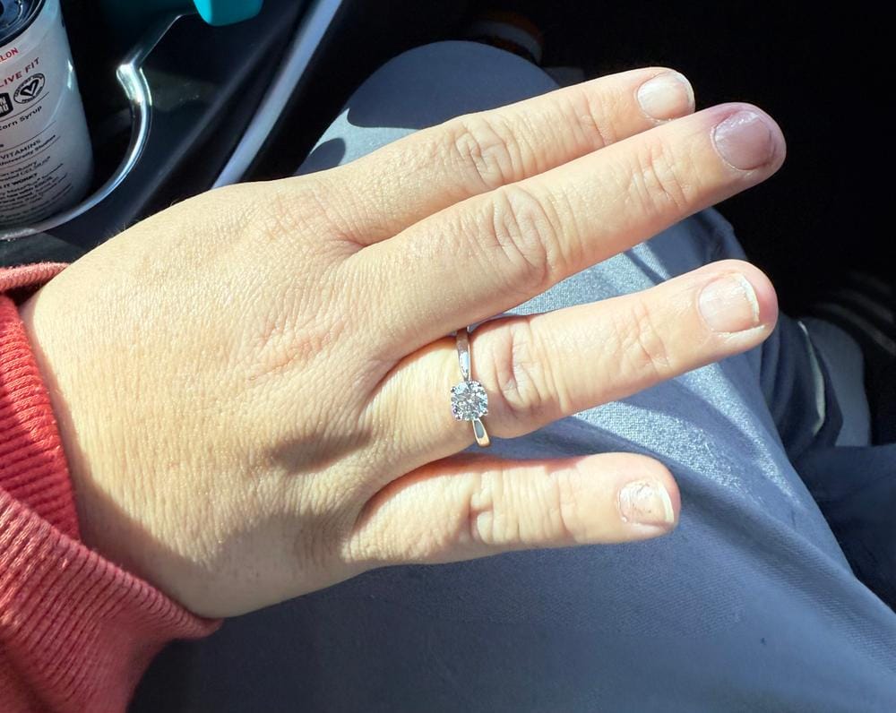 Customer photo review of Moissanite by Cate & Chloe Abigail 1.0tcw Round Cut 925 Sterling Silver 18k White Gold Plated Engagement Ring