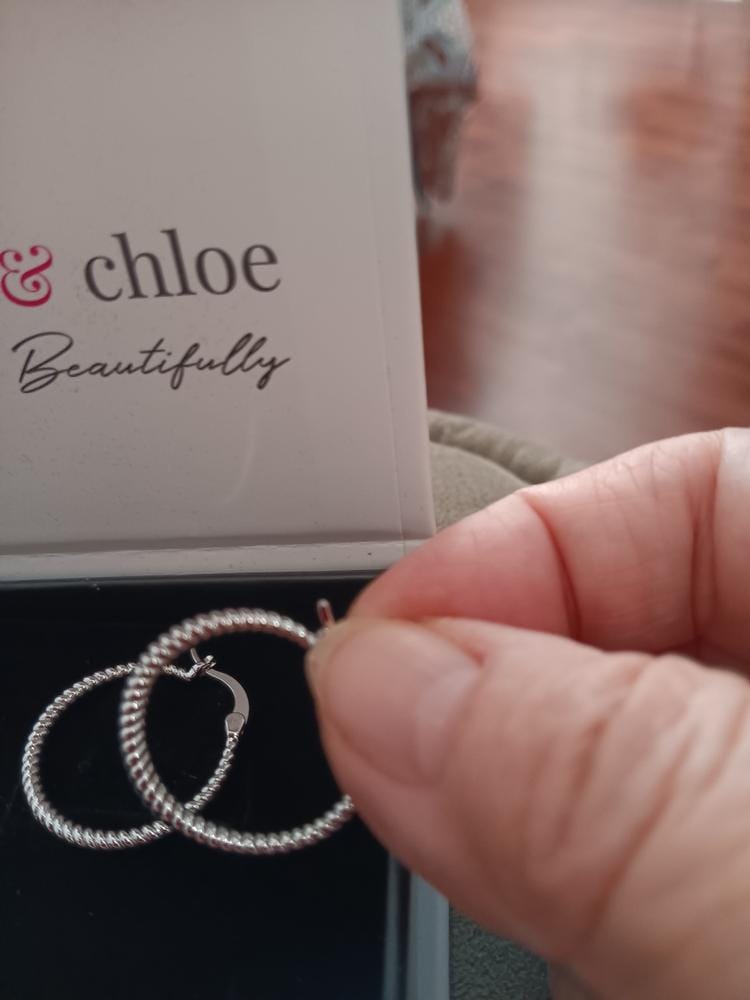 Customer photo review of Matilda 18k White Gold Plated 25mm Twisted Hoop Earrings