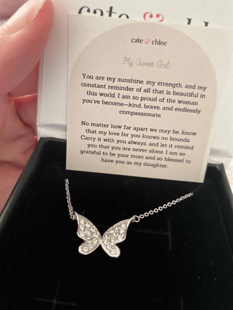 Customer photo review of Yuenen 18k White Gold Plated Butterfly Necklace with Swarovski Crystals & Heartfelt Message for Daughter