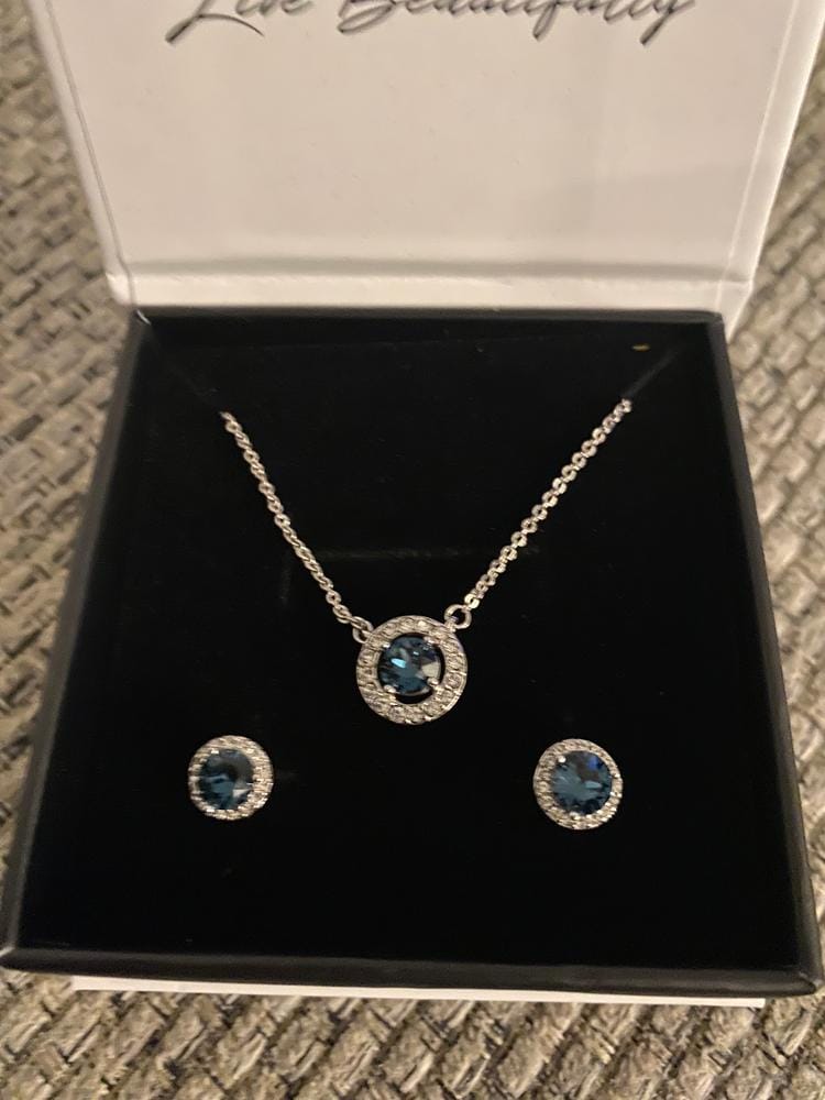 Customer photo review of Royal Birthstone 18k White Gold Plated Halo Stud Earrings with Round Cut Swarovski Crystals