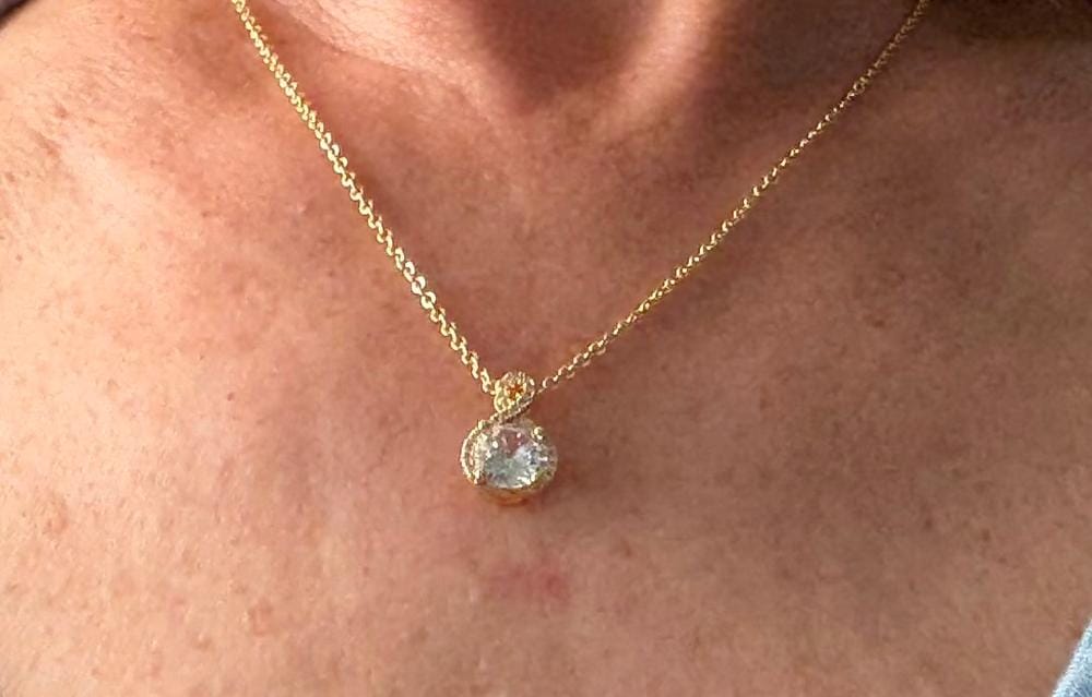 Customer photo review of Alessandra 18k White Gold Plated Infinity Halo Pendant Necklace with Simulated Diamond Crystals