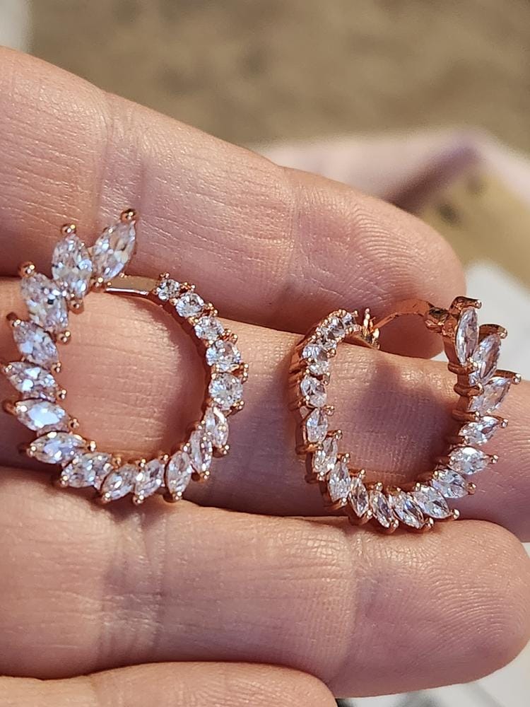 Customer photo review of Adelyn 18k Gold Plated Sideways Hoop Earrings with Simulated Diamond Crystals — Final Sale