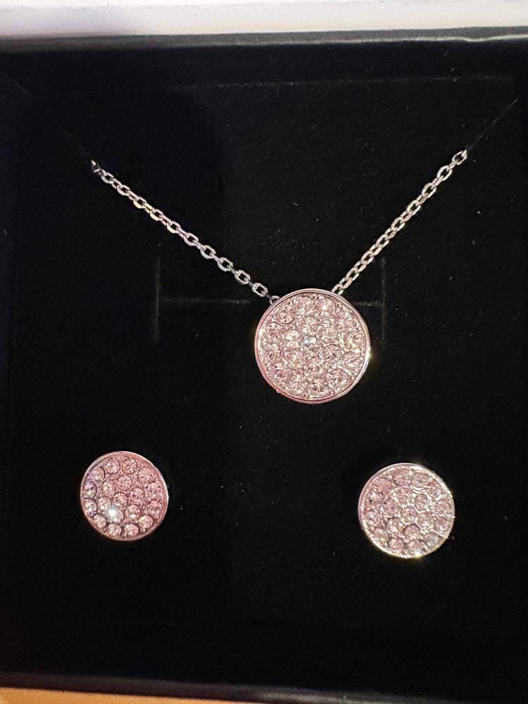 Customer photo review of Nelly 18k White Gold Plated Pave Stud Earrings with Swarovski Crystals