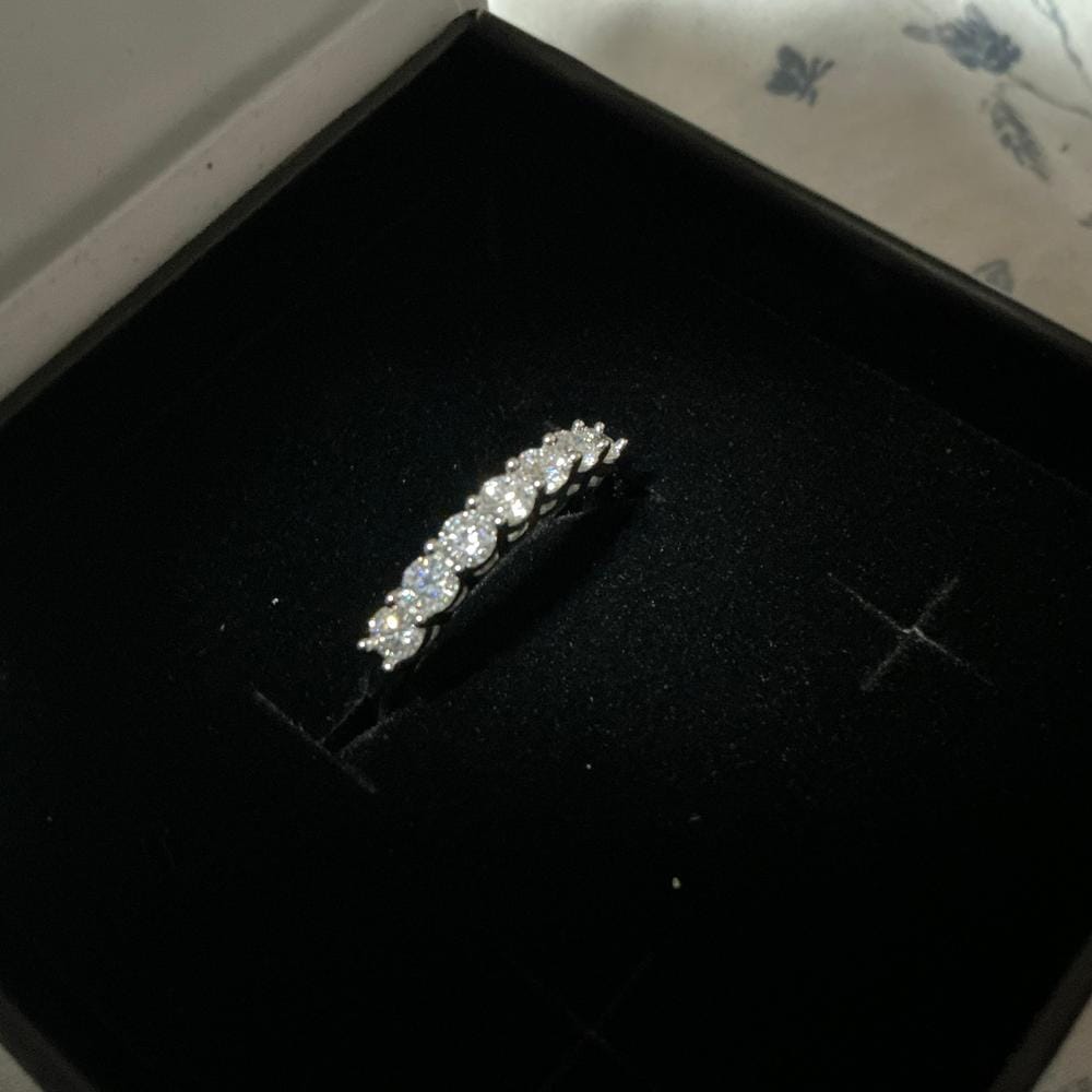 Customer photo review of Moissanite by Cate & Chloe Josephine 0.77tcw Round Cut 925 Sterling Silver 18k White Gold Plated Wedding Band