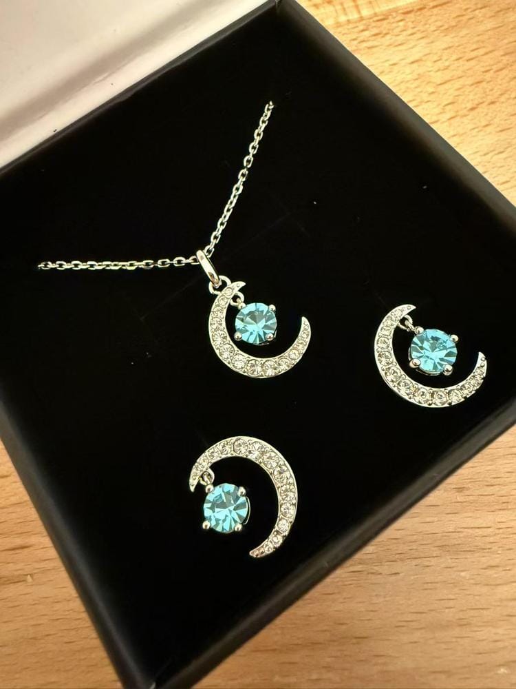 Customer photo review of Luna Birthstone Necklace 18k White Gold Plated Crescent Pendant Necklace with Round Cut Swarovski Crystals