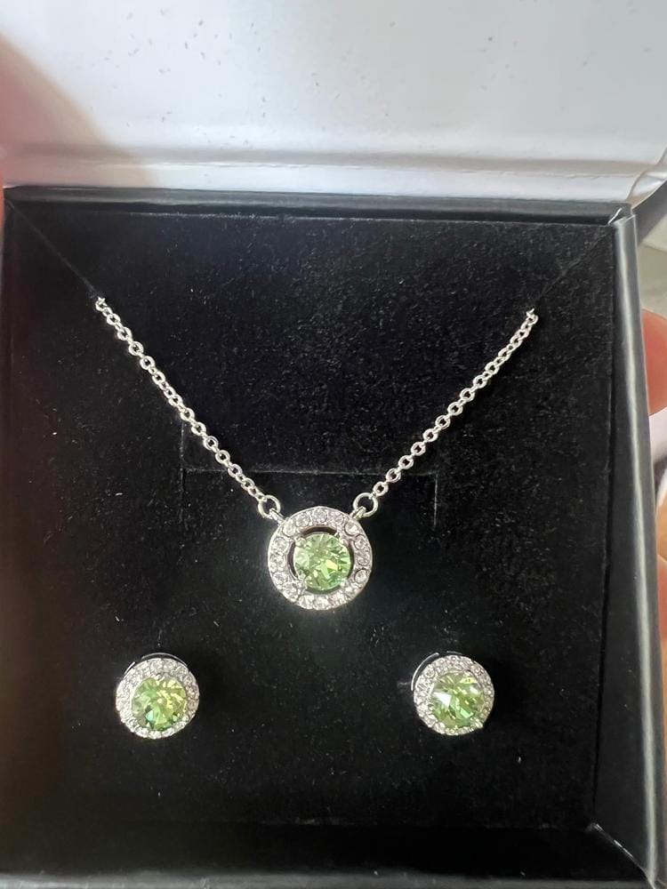 Customer photo review of Royal Birthstone 18k White Gold Plated Halo Stud Earrings with Round Cut Swarovski Crystals