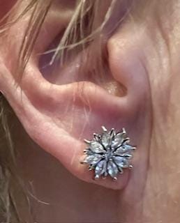 Customer photo review of Lily 18k White Gold Plated Flower Stud Earrings with Simulated Diamond Crystals