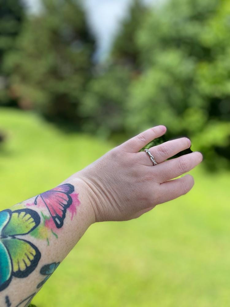 Customer photo review of Moissanite by Cate & Chloe Avery 0.21tcw Round Cut 925 Sterling Silver 18k White Gold Plated Wedding Band