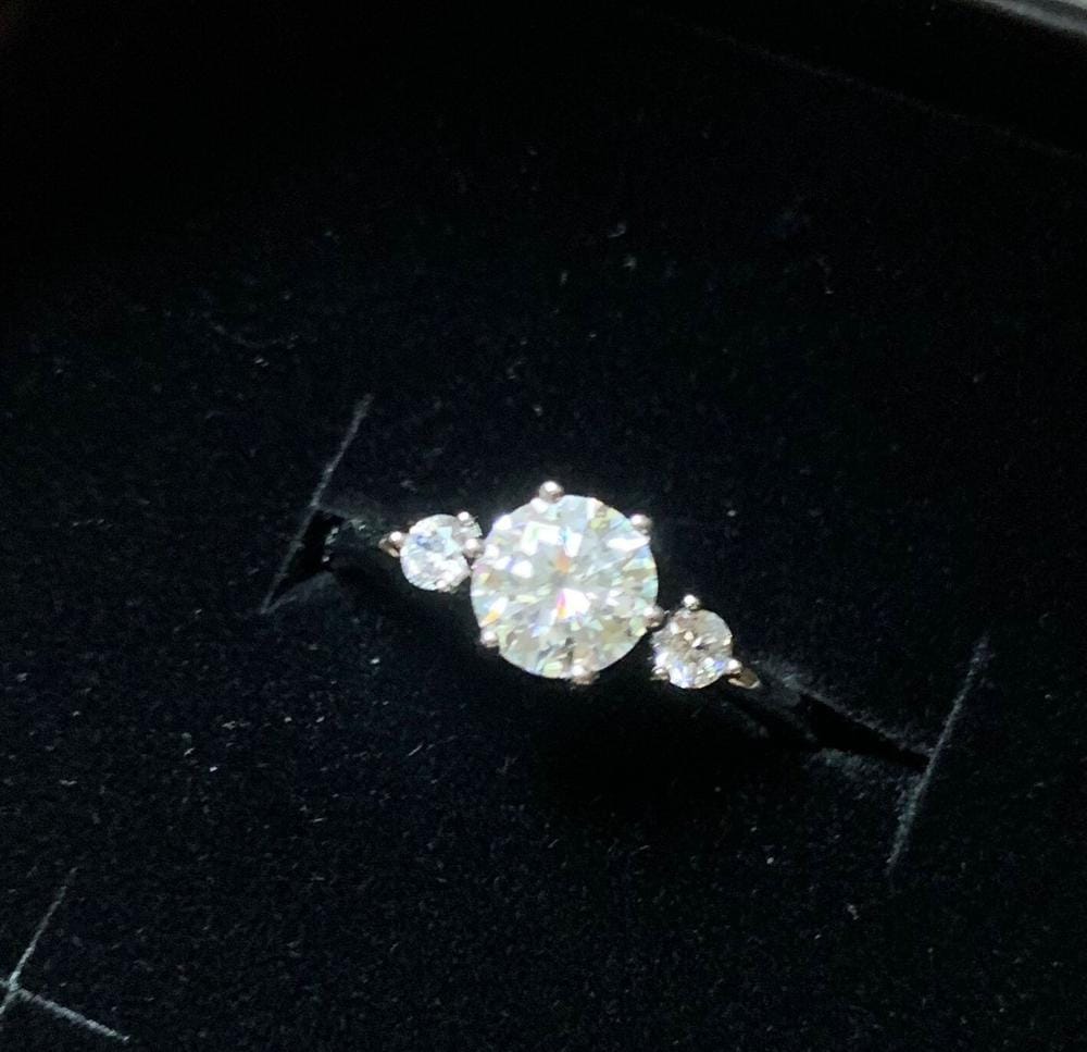 Customer photo review of Moissanite by Cate & Chloe Sarah 1.22tcw Round Cut 925 Sterling Silver 18k White Gold Plated Engagement Ring