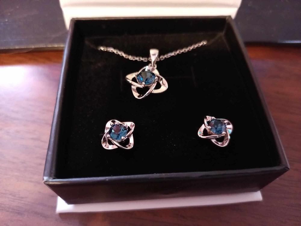 Customer photo review of Infinity 18k White Gold Plated Birthstone Flower Earrings with Swarovski Crystals