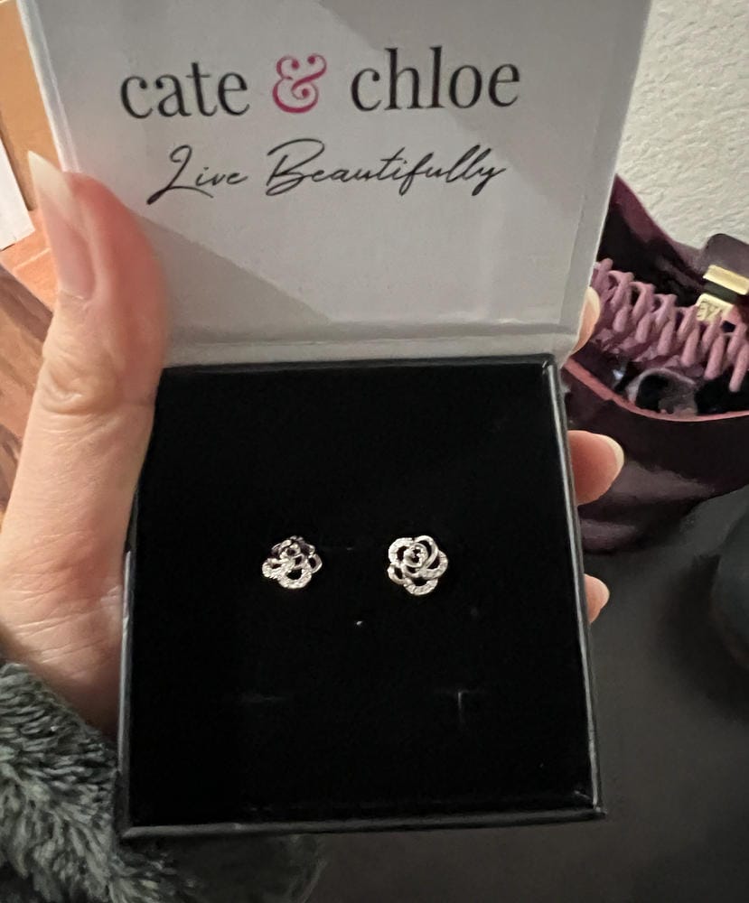 Customer photo review of Briella 18k White Gold Plated Silver Flower Stud Earrings with Swarovski Crystals