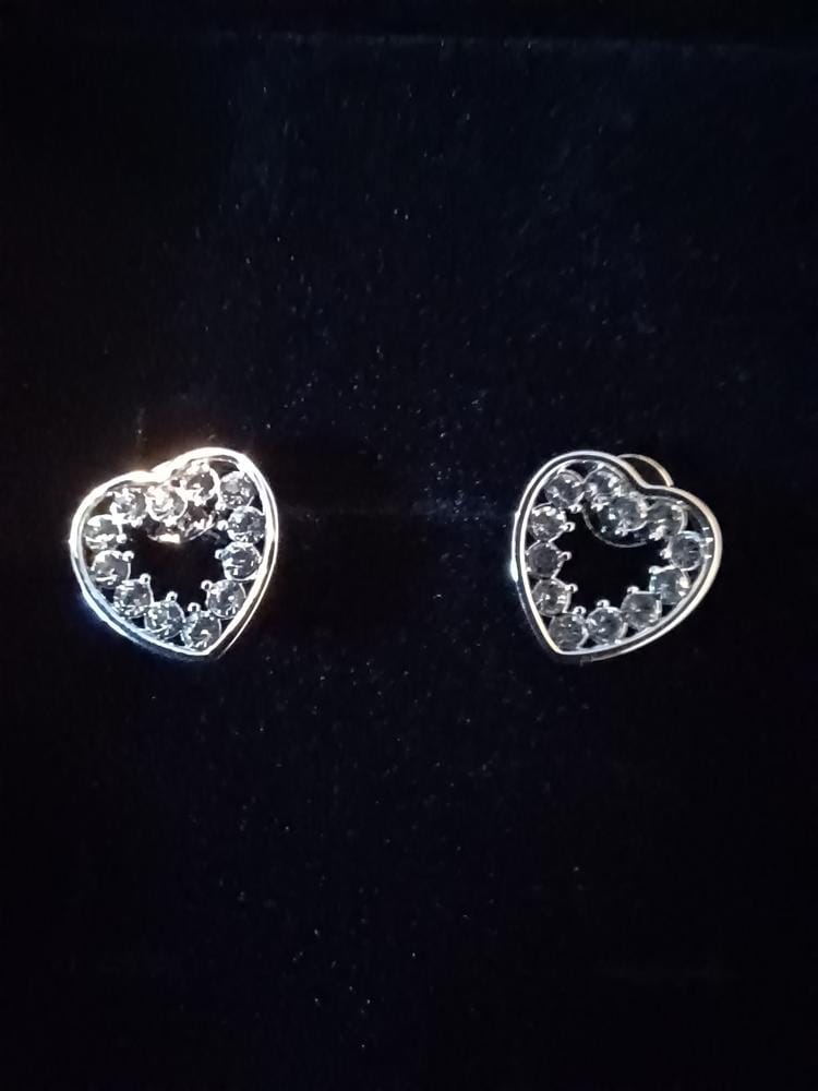 Customer photo review of Coraline 18k White Gold Plated Silver Heart Stud Earrings with Simulated Diamond Crystals