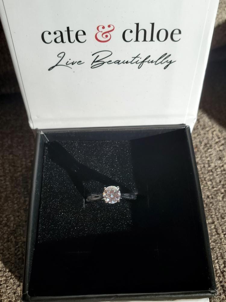 Customer photo review of Moissanite by Cate & Chloe Abigail 1.0tcw Round Cut 925 Sterling Silver 18k White Gold Plated Engagement Ring