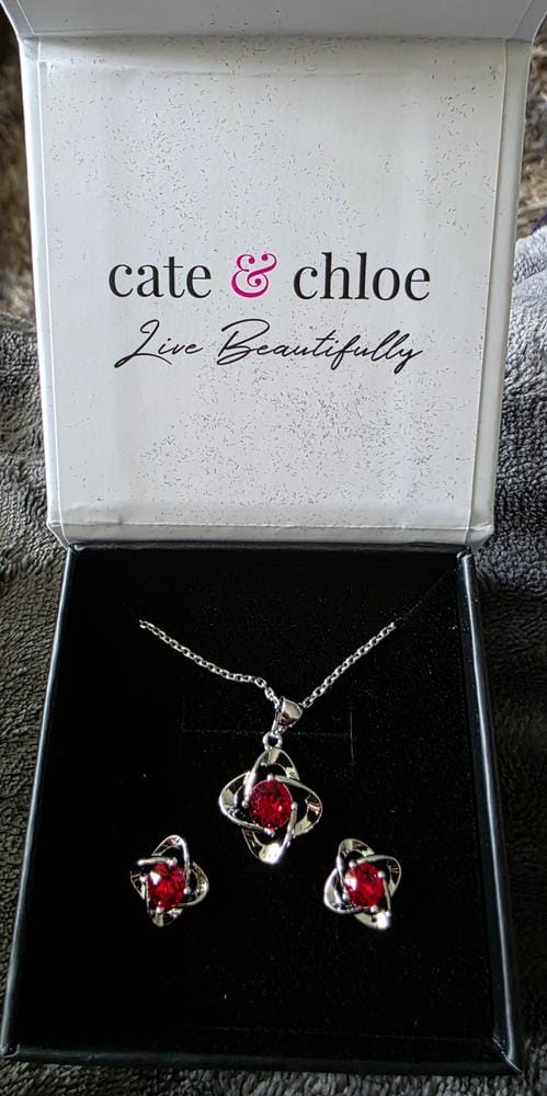 Customer photo review of Infinity 18k White Gold Plated Birthstone Flower Earrings with Swarovski Crystals