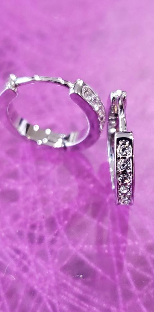 Customer photo review of Skye 18k White Gold Plated 12mm Crystal Hoop Earrings with Swarovski Crystals